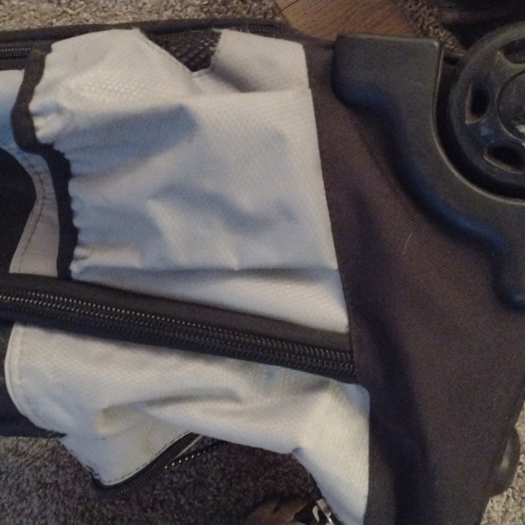 ROOTS WHEELED CARRY ON.  NUMEROUS COMPARTMENTS.  GENTLY USED. - Picture 6 of 9